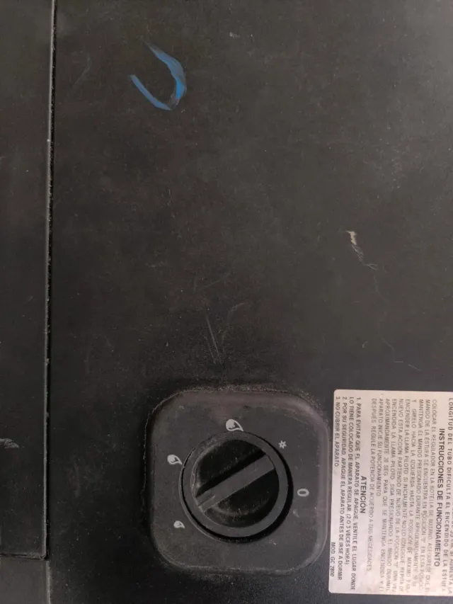 Estufa de gas negra y gris