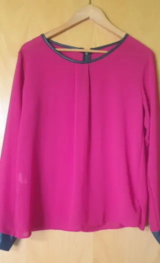 Blusa roja
Regalo con otra compra