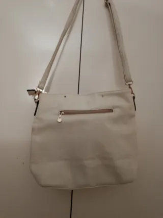 Bolso beige con logo circular