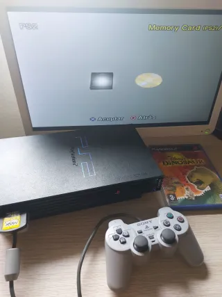 PlayStation 2 mando + Juego Dinosaurio