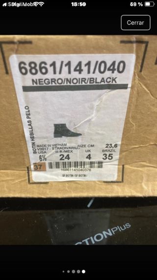 Botines Zara pelo negro con tachuelas