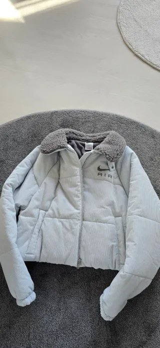 Giacca corta Nike donna grigio chiaro