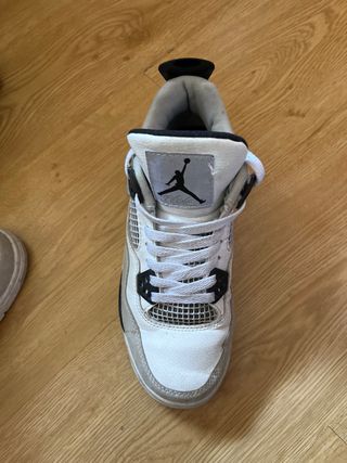 Zapatillas Jordan 4 Negras y Blancas 