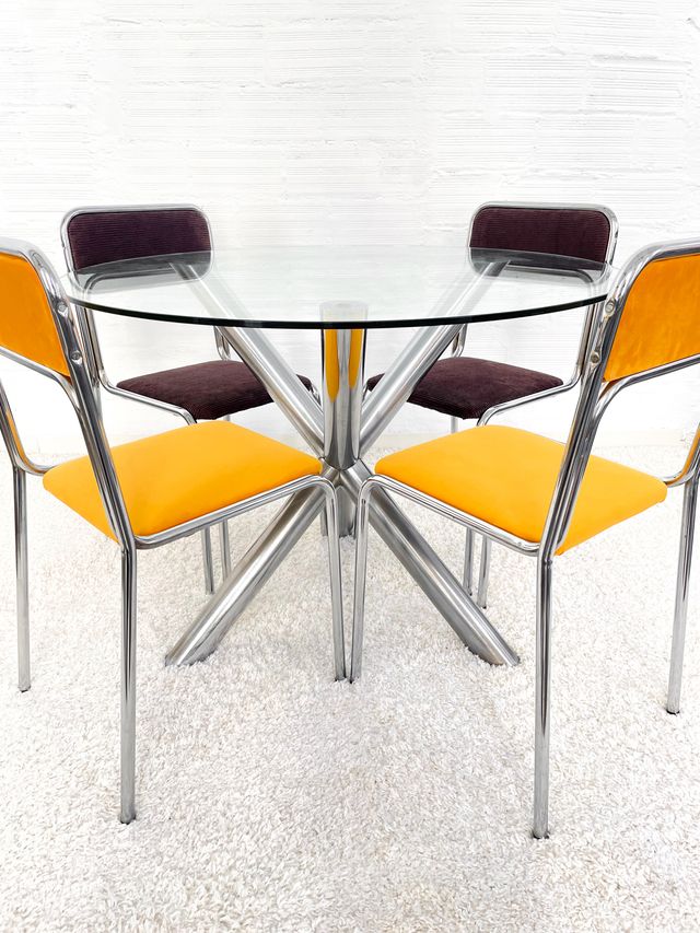 Mesa comedor Renato Zevi cristal y metal