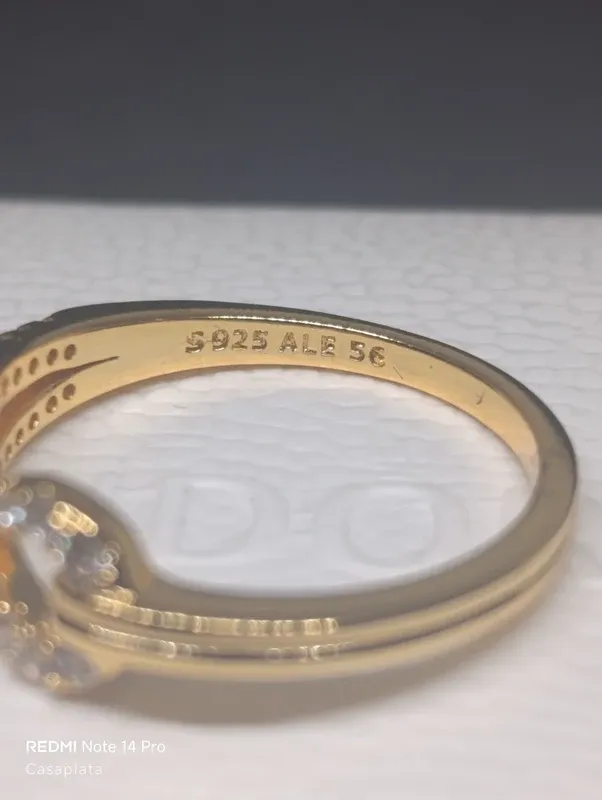 Anillo Pandora Infinite plata y oro 14K.