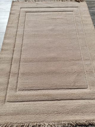 Alfombra de lana beige