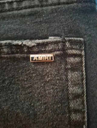 Pantalones Amiri negros y grises