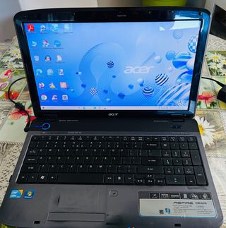 Ordenador Acer, con programas de productividad y W