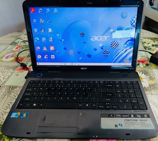 Ordenador Acer, con programas de productividad y W