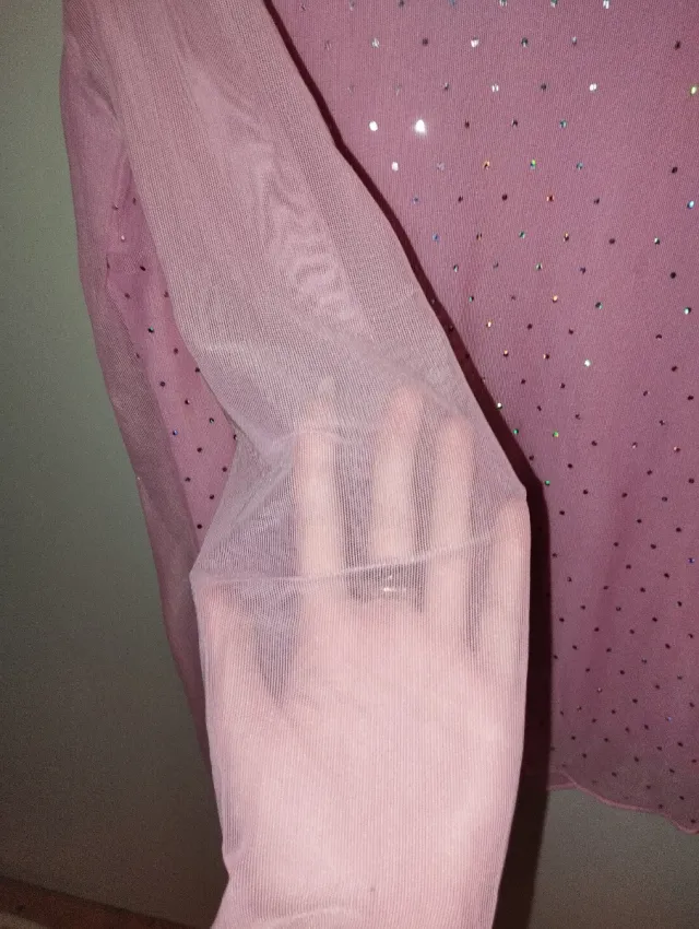 Maglia rosa con brillantini