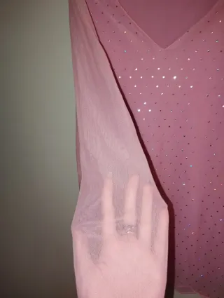 Maglia rosa con brillantini