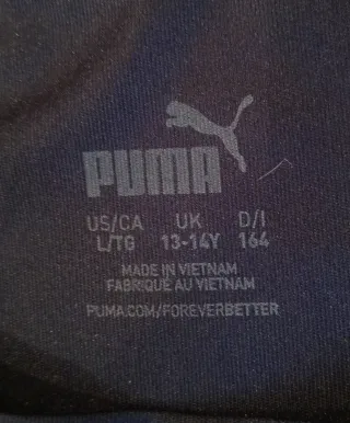 Camiseta deportiva Puma azul y blanco