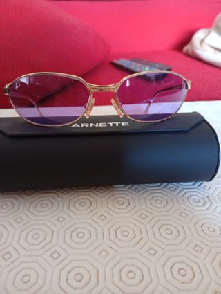 Gafas de sol Arnette doradas y malvas