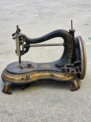 Máquina de coser Antigua Serpentine Jones 1901