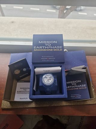 Swatch Mission Earthphase Moonshine Gold