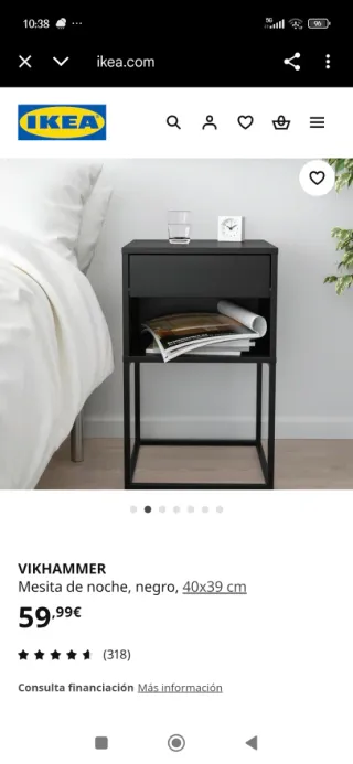 Mesita de noche negra con detalle dorado