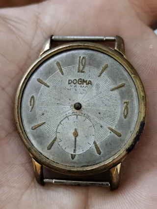 Reloj Dogma Dorado y Blanco