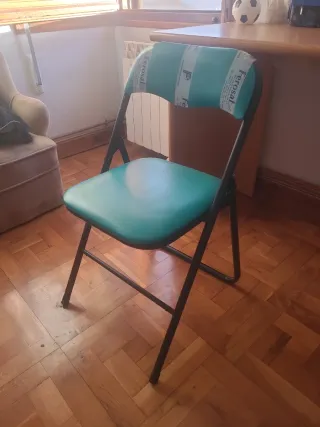 Silla plegable negra y verde