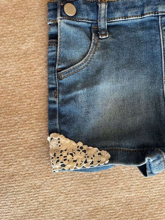 Peto vaquero bebé con encaje