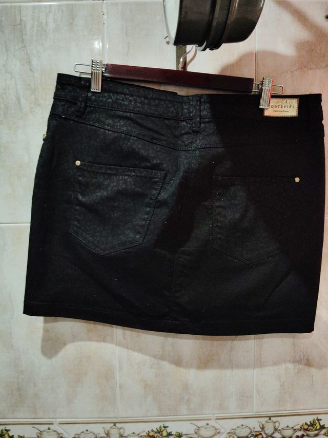 Falda negra vaquera mujer