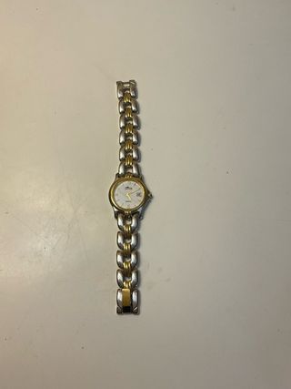 Reloj Lotus Oro y Plata