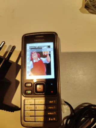 Telefono cellulare Nokia 6300 Silver + caricabatterie