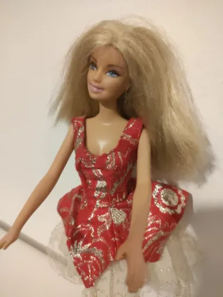 Barbie 1977 con abiti originali
