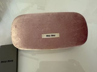 Gafas de sol Miu Miu doradas y marrones