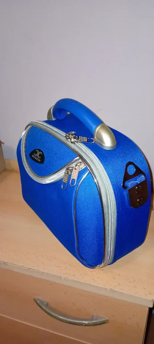 Neceser HUAXIN azul y plateado