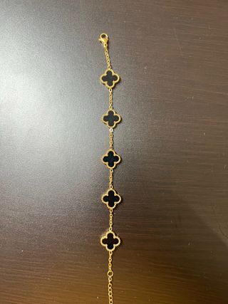 Pulsera tréboles oro y negro