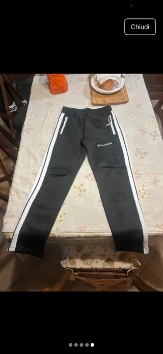 Tuta Palm Angels nera con bande bianche