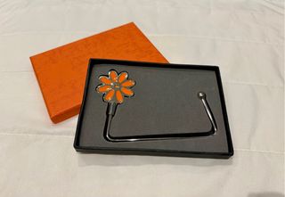 Gancio porta borsa da tavolo fiore arancio