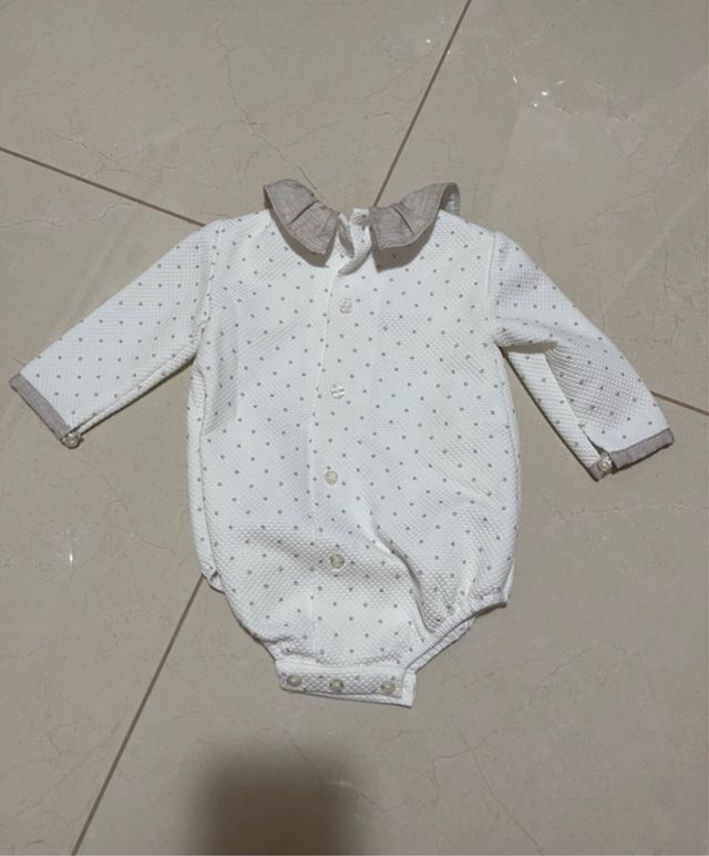 Pagliaccetto neonata con pois