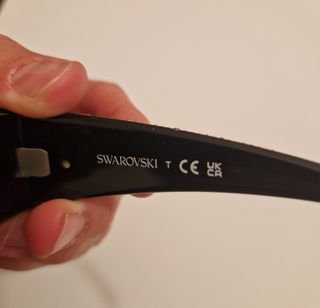 Occhiali da sole Swarovski neri e argento