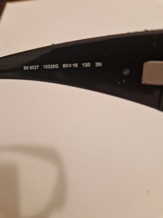 Occhiali da sole Swarovski neri e argento