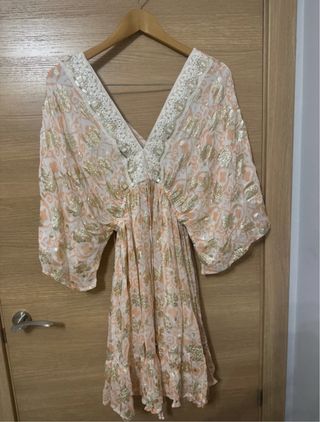 Vestido estampado dorado y naranja