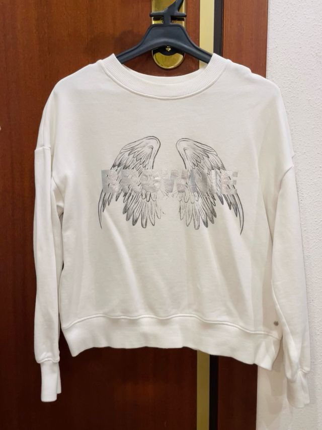 Sudadera Brownie blanca con alas plateadas
