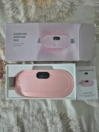 Masaje y calefacción abdomen femenino