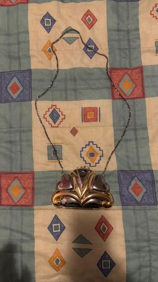 Bolso de fiesta dorado y plateado