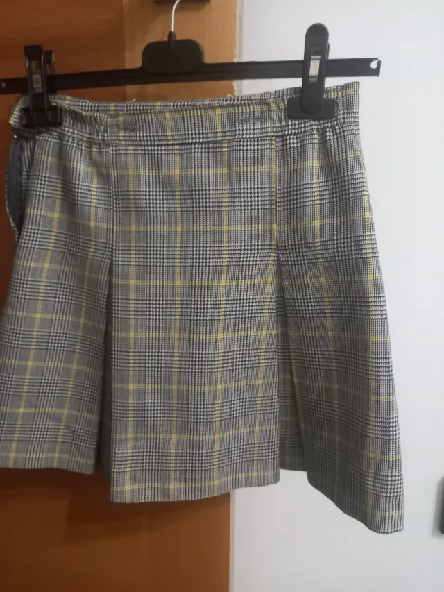 Falda colegio OPE cuadros
Talla 8.