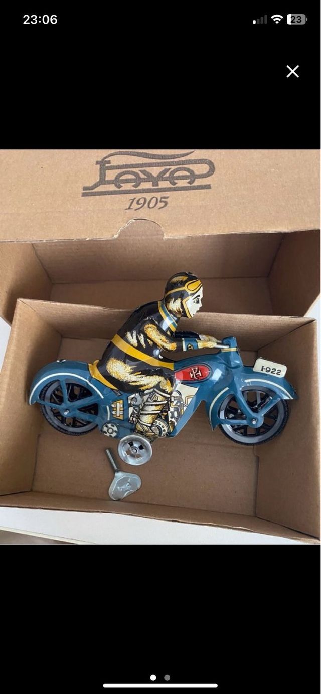 Juguete de hojalata antiguo (reproduccion)