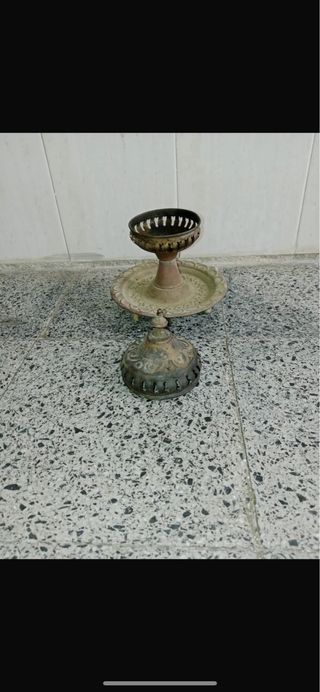 Calentador de latón antiguo