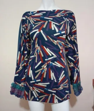 Top manica lunga fantasia geometrica