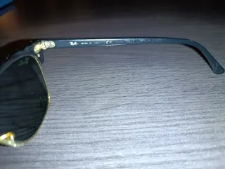 Gafas de sol Ray-Ban negras y doradas RB 3016