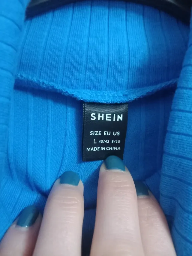 Jersey azul cuello alto