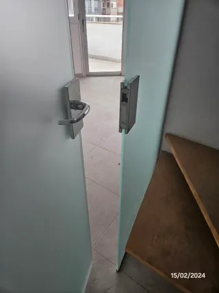 Puerta cristal + ventanal fijo