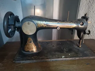 Antiguo mueble expositor de tienda Singer