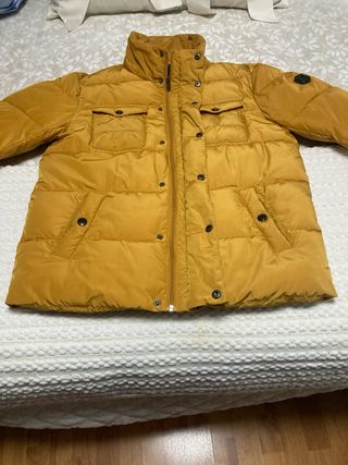 Chaqueta impermeable color mostaza T50 ajustado