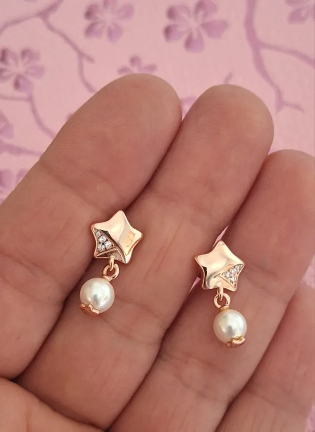 Pendientes estrella perla plata