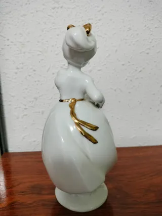 Figura porcelana niña oro Sanbo